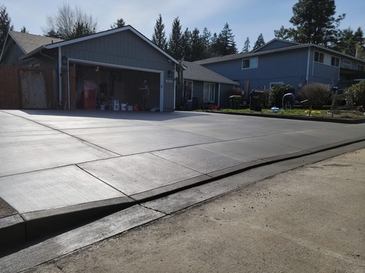 Concrete driveway and sidewalk approach installati